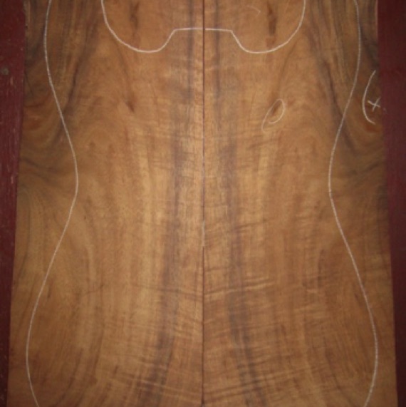 Koa Electric/Bass Top AAA $75
(2) top plates 7-1/2" x 20-1/4" (tapering to 
6-3/8" width)
Air dried since 2015, 13" x 18-1/2" pattern shown, good fiddleback curl.
(2)) consecutive sets available   -   set #136-1139