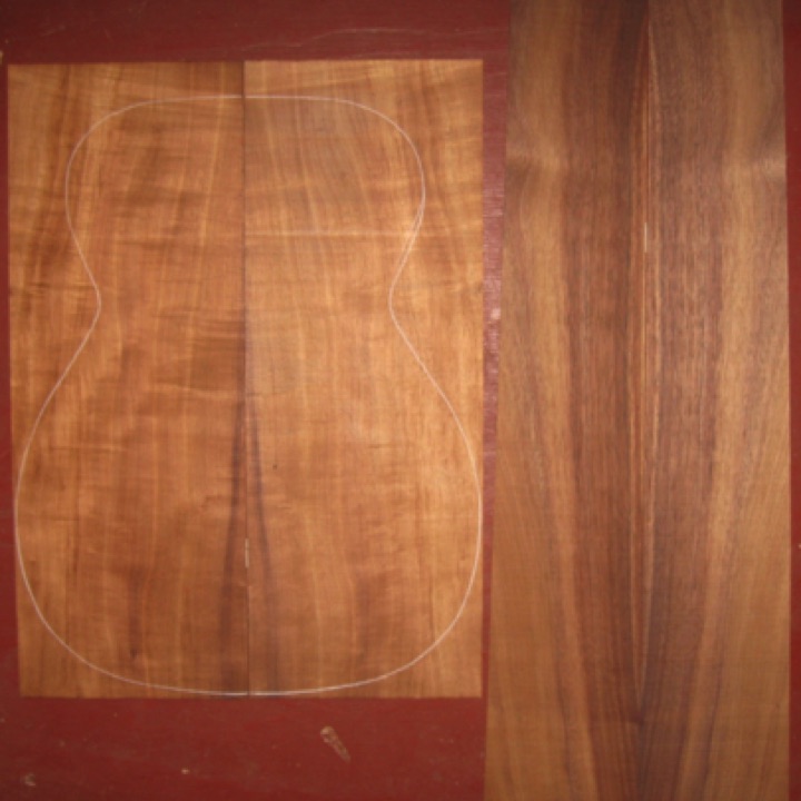 Koa OM/CL AA  $145
(2) back plates 7-11/16" x 21"
(2) side plates 5" x 32" (taper to 4-3/8")
Air dried since 2016, 15-1/4" OM pattern shown, plates matched from same tree, good flame on backs.
set #175-2162