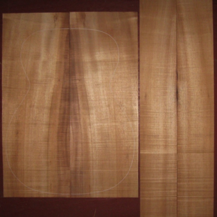 Koa OM/CL AA+  $180
(2) back plates 8" x 22"
(2) side plates 4-3/8" x 3/2"
Air dried since 2017, 15-1/4" OM pattern shown; bright blond-brown koa with plenty curl.
set #203-1843