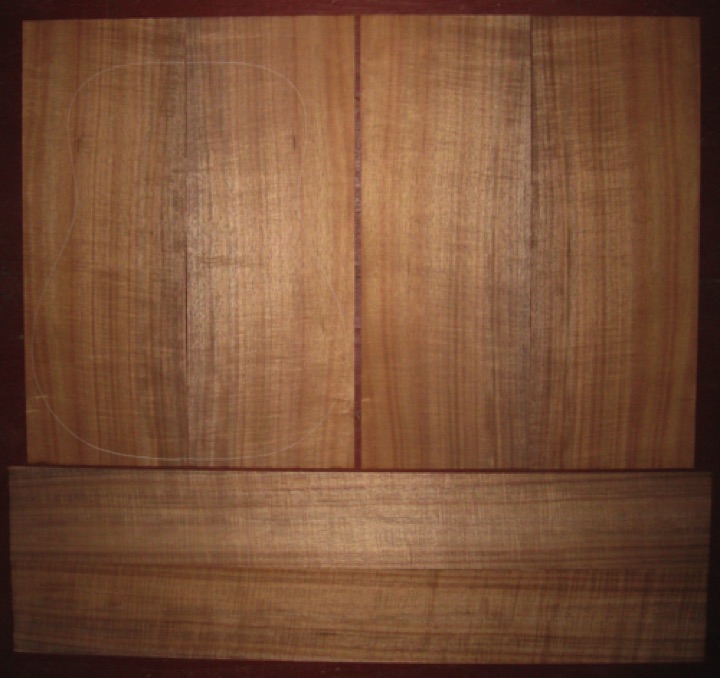 Koa OM/Dreadnought AAA  $400
(4) top-back plates 8-1/2" x 22-7/8"
(2) side plates 5" x 36"
16" dred pattern shown, bright orange-brown, straight & vertical grain, tight curl. Gorgeous koa.
set #178-1525