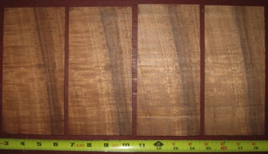 (4) koa headplates 4A $32 + $7 shipping
Four sequential-cut headplates each 7-1/2" x 3-3/4". Thickness: .180" (4.5mm). Seasoned 20+ yrs. Good color, strong flame.
headplates #2275